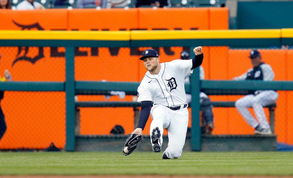 Left fielder Austin Meadows (17) of the Detroit Tigers makes a catch on a fly ball hit by Jonathan Arauz of the Boston Red Sox during the third inning at Comerica Park on April 11, 2022, in Detroit, Michigan.