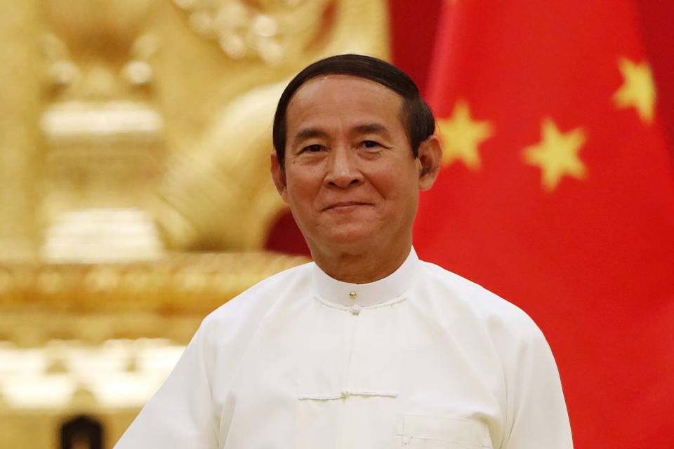 FILE - Myanmar's President Win Myint shakes hands with Chinese President Xi Jinping, unseen, during their meeting at the Presidential Palace in Naypyitaw, Myanmar, on Jan. 17, 2020. Myanmar’s military’s spokesperson, Maj. Gen. General Zaw Min Tun, has told foreign media representatives late Tuesday, April 16, 2024, that 78-year-old Aung San Suu Kyi and the president of her former government, 72-year-old Win Myint, were among the elderly and infirm prisoners moved from out of prison because of the severe heat. The move has not yet been publicly announced in Myanmar. (AP Photo/Aung Shine Oo, File)