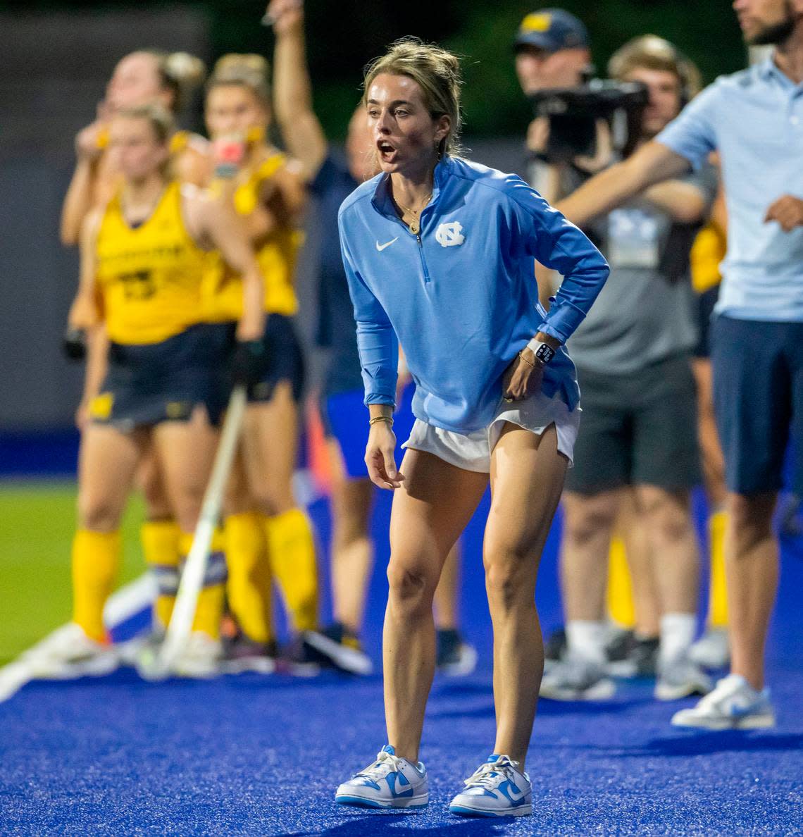 North Carolina field hockey coach Erin Matson, questions a call by the officials during her first win as head coach, a 3-2 victory against Michigan, on Friday, August 25, 2023 at Karen Shelton Stadium in Chapel Hill, N.C.