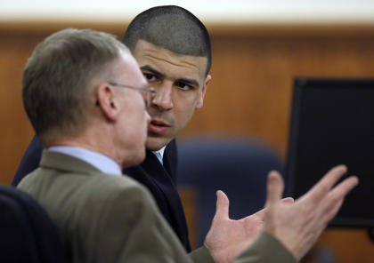 Aaron Hernandez, right, will have to wait through the weekend for a jury's verdict. (AP)