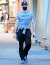 <p>Hugh Jackman leaves the gym on Tuesday in N.Y.C., wearing a baseball cap, a "squad" tee and sneakers.</p>