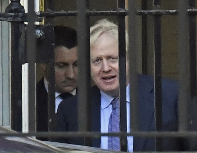 British Prime Minister Boris Johnson leaves from the back of Downing Street, London, on his way to Brussels for the European EU Summit, Thursday Oct. 17, 2019. Britain and the European Union said Thursday that they have struck an outline Brexit deal after days of intense see-saw negotiations — though it must still be formally approved by the bloc and ratified by the European and U.K. Parliaments. (Kirsty O'Connor/PA via AP)
