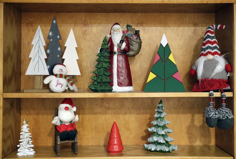 Miniature Christmas trees brighten the home of Lee and Joy Hillstrom in Neenah.