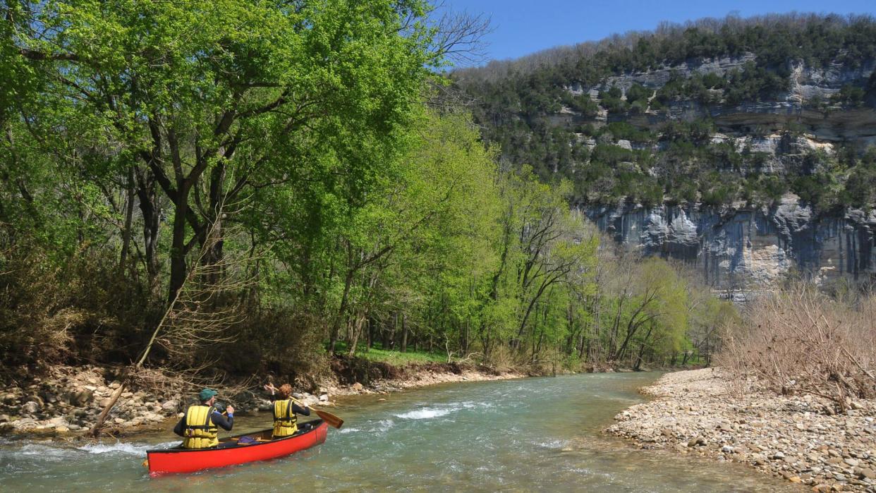 Adventure, Arkansas, Buffalo River, Canoeing, Cliff, Couple, Floating On Water, Flowing, Flowing Water, Forest, Gravel, Gravel Bar, Horizontal, Landscape, Mature Adult, Men, Nautical Vessel, Paddling, People Traveling, Plant, Rapid, Red, River, Sandbar, Scenics, Shallow, Stream, Tree, Two People, Water, Women, Woods, Yellow, canoe, life jacket, nature, spring