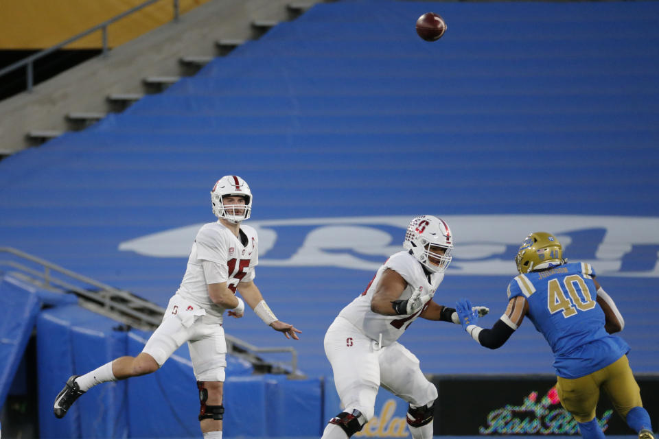 Stanford quarterback Davis Mills (15) passes the ball during the first half of an NCAA college football game between UCLA and Stanford Saturday, Dec. 19, 2020, in Pasadena, Calif. (AP Photo/Ringo H.W. Chiu)