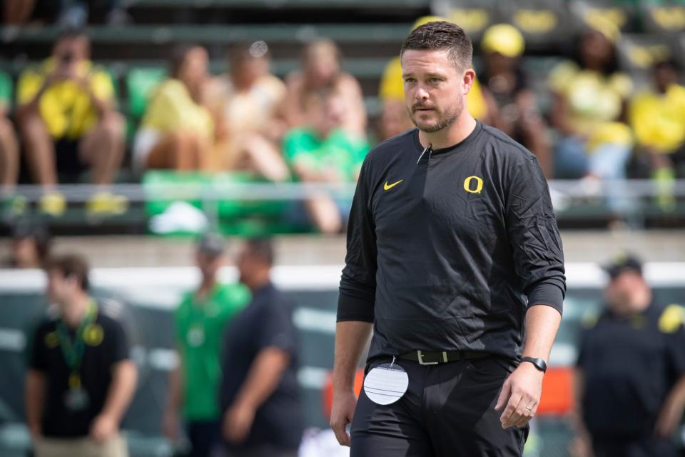 Oregon head coach Dan Lanning walks the field as the Oregon Ducks warm up to host Portland State in the Ducks’ season opener on Sept. 2 at Autzen Stadium in Eugene.