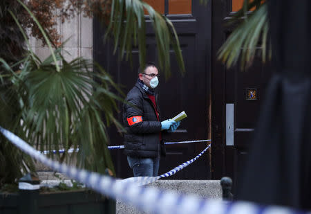 A police investigator is seen outside the police headquarters after a policeman was stabbed in Brussels, Belgium November 20, 2018. REUTERS/Yves Herman