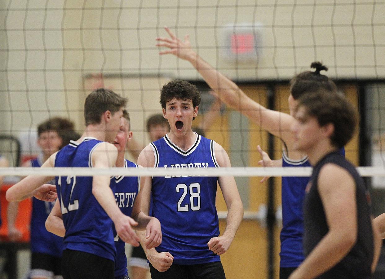 Liberty's Noah Koknat celebrates a point during a 25-27, 25-20, 25-8, 25-20 victory over Mount Vernon in a Division I regional final May 28 at Westerville Central. Koknat, a senior outside hitter, was first-team all-state and Player of the Year in the East Region and OCC-Central.