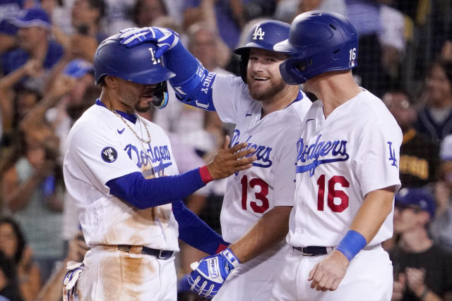 Betts and Muncy, both new dads, power Dodgers past Cards 7-3