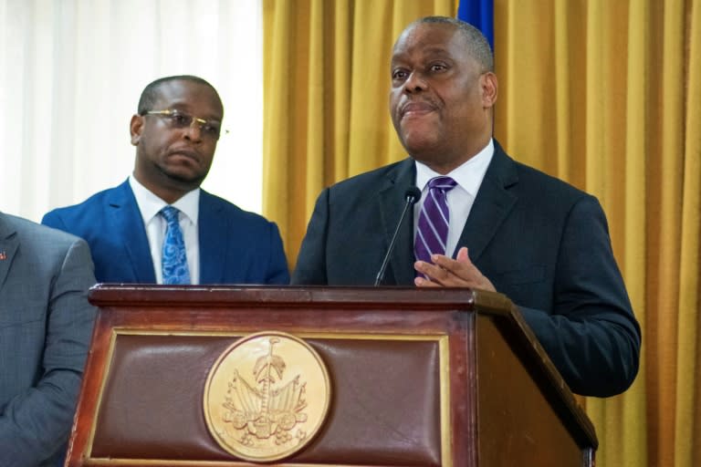 Garry Conille (R) speaks after being installed as Haiti's Prime Minister in Port-au-Prince (Clarens SIFFROY)