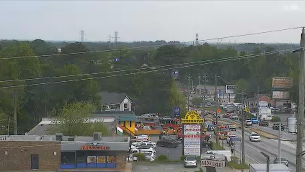 <div>Gwinnett County firefighters surround the InTown Suites Extended Stay along Buford Highway, just north of Jimmy Carter Boulevard, in Norcross on April 17, 2024.</div> <strong>(Georgia Department of Transportation)</strong>