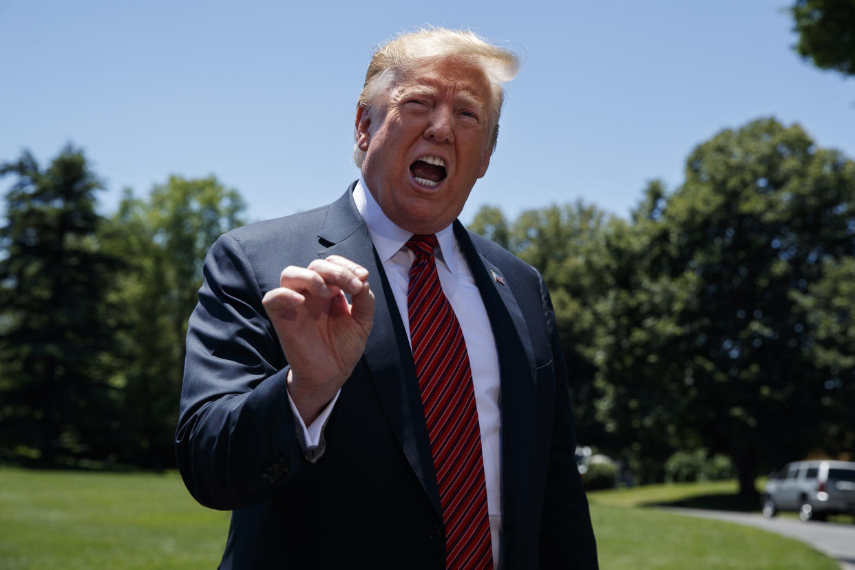 President Donald Trump speaks to reporters before departing for a trip to Iowa, on the South Lawn of White House, Tuesday, June 11, 2019, in Washington. (AP Photo/Evan Vucci)   