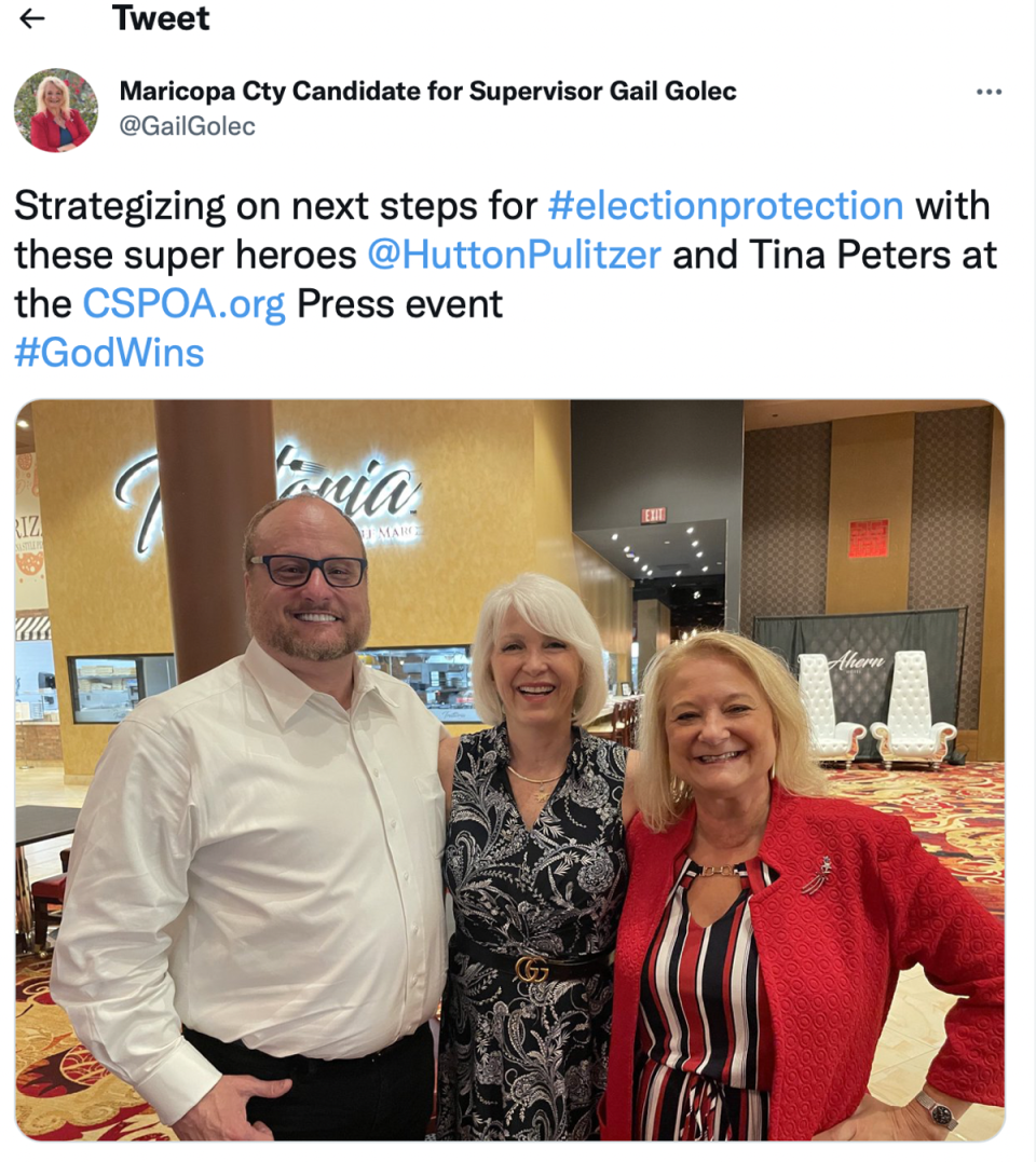 Tina Peters, centre, posed for a photo at a conference in Las Vegas on 12 July (Twitter)