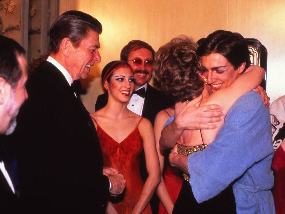 Nancy Reagan hugs Ron Reagan Jr after a ballet performance