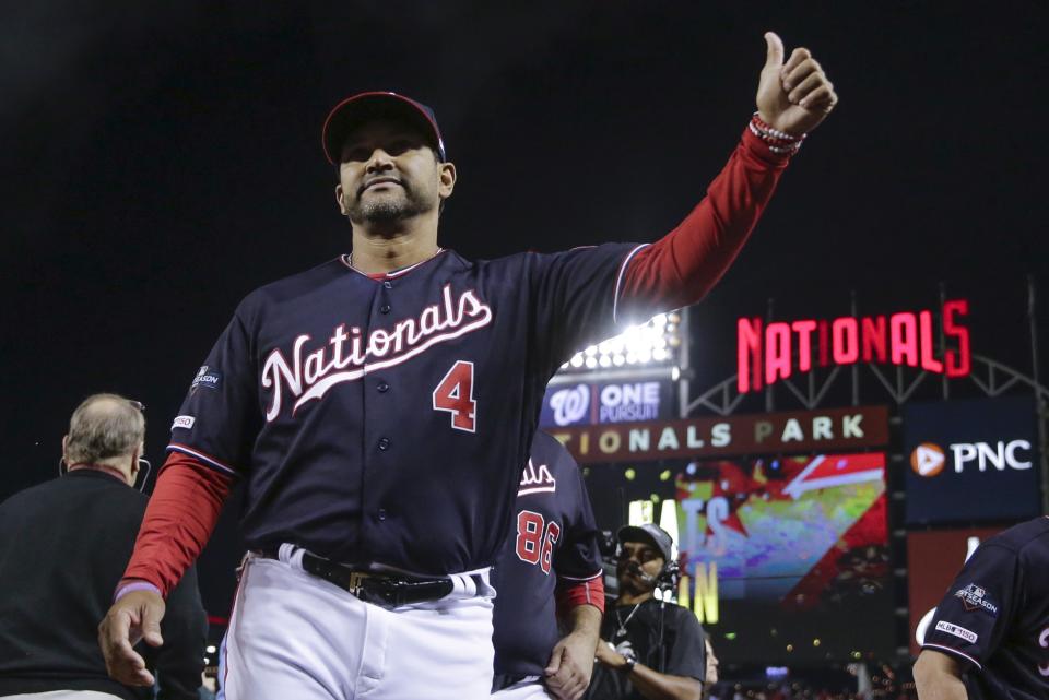 Washington Nationals manager Dave Martinez gives a thumbs up after Game 3 of the baseball National League Championship Series against the St. Louis Cardinals Monday, Oct. 14, 2019, in Washington. The Nationals won 8-1 to take a 3-0 lead in the series.(AP Photo/Jeff Roberson)