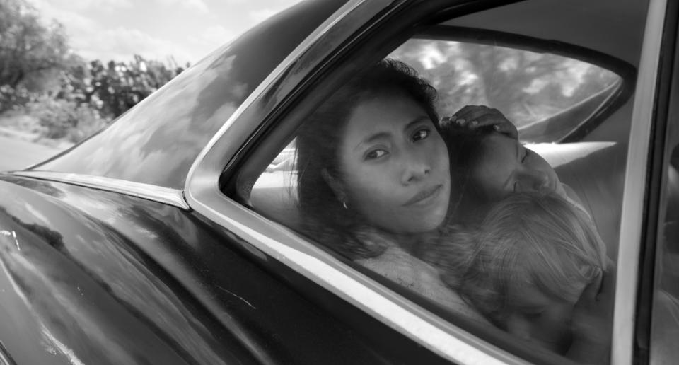 This image released by Netflix shows Yalitza Aparicio in a scene from the film "Roma," by filmmaker Alfonso Cuaron. Aparicio portrays Cleo, a domestic worker who works for a woman whose husband abandons her and their four children. (Alfonso Cuarón/Netflix via AP)