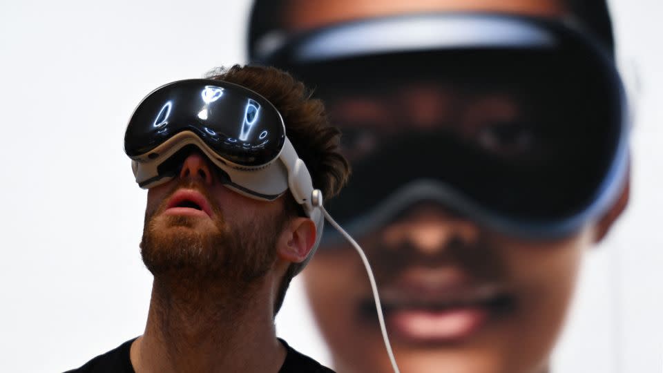 A person wears Vision Pro headset the product release at the Apple Store in New York City on February 2, 2024. The Vision Pro, the tech giant's $3,499 headset, is its first major release since the Apple Watch nine years ago. - Angela Weiss/AFP/Getty Images