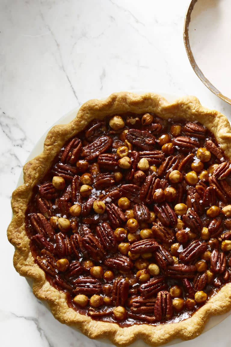 <p>Your crowd will go nuts for these toasted pecans, walnuts, and hazelnuts held together by sweet caramel.</p><p><em><a href="https://www.goodhousekeeping.com/food-recipes/a46628/salted-caramel-mixed-nut-pie-recipe/" rel="nofollow noopener" target="_blank" data-ylk="slk:Get the recipe for Salted Caramel Mixed Nut Pie»;elm:context_link;itc:0;sec:content-canvas" class="link ">Get the recipe for Salted Caramel Mixed Nut Pie»</a></em> </p>
