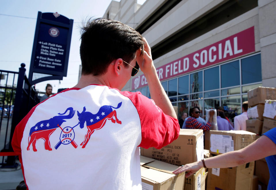 A Democratic supporter waits in line