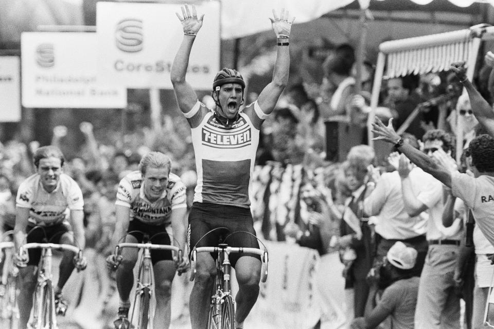 FILE 0 Olympic gold medalist Eric Heiden raises his hands in victory at the finish line of the Core States U. S. Pro Cycling Championship Race, Sunday, June 23, 1980, Philadelphia, Pa. Widman, a longtime photographer for the Associated Press and others as well as a Pulitzer Prize finalist, died at his Trappe, Pa., home Friday, March 8, 2024. He was 79. (AP Photo/George Widman, File)