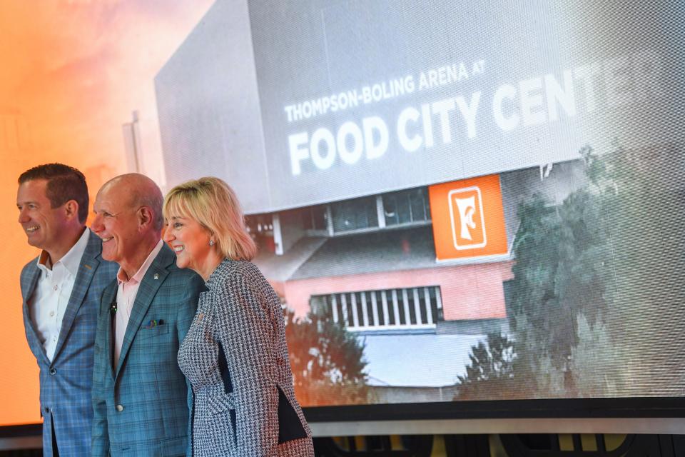 Tennessee athletics director Danny White, Food City president Steven Smith, and University of Tennessee Chancellor Donde Plowman, pose for a photo after announcing the change in name of Thompson-Boling Arena to Thompson-Boling Arena at Food City Center.