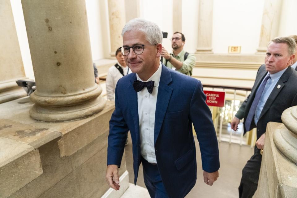 Representative Patrick McHenry walks to the House speaker’s office.