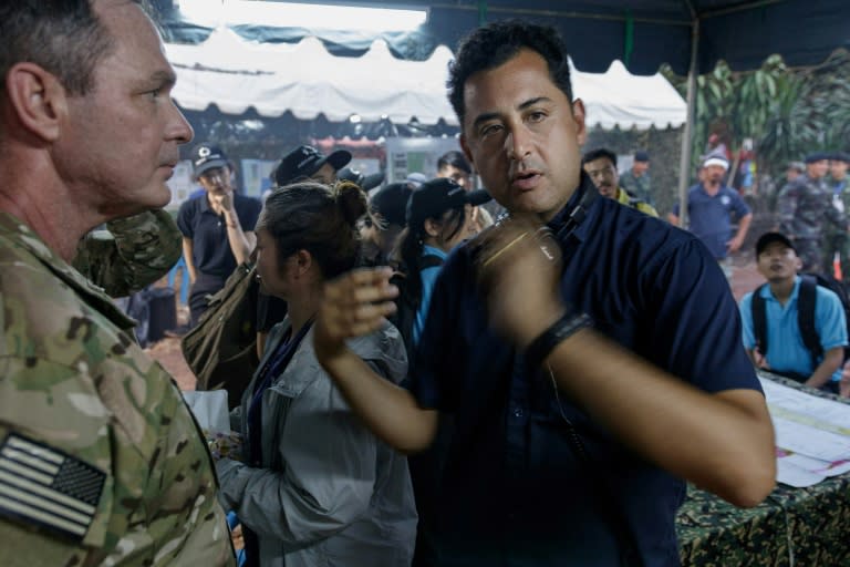 Director Tom Waller (R, with US actor James Edward Holley) says he wanted to show the volunteer spirit of the rescue and the unsung heroes