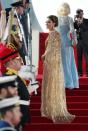 <p>The Duchess of Cambridge looked just like a Bond girl while attending the <em><a href="https://www.townandcountrymag.com/society/tradition/a37710183/kate-middleton-james-bond-premiere-gold-dress-photos/" rel="nofollow noopener" target="_blank" data-ylk="slk:No Time to Die;elm:context_link;itc:0;sec:content-canvas" class="link ">No Time to Die </a></em><a href="https://www.townandcountrymag.com/society/tradition/a37710183/kate-middleton-james-bond-premiere-gold-dress-photos/" rel="nofollow noopener" target="_blank" data-ylk="slk:premiere in London;elm:context_link;itc:0;sec:content-canvas" class="link ">premiere in London</a>. Her glimmering, gold cape dress was from designer Jenny Packham. </p>
