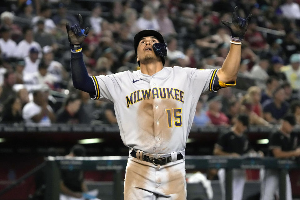 Milwaukee Brewers' Tyrone Taylor reacts after hitting a solo home run against the Arizona Diamondbacks during the sixth inning of a baseball game Saturday, Sept. 3, 2022, in Phoenix. (AP Photo/Rick Scuteri)