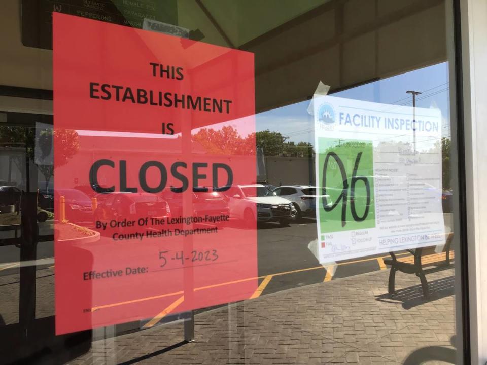 A sign on the door of Puccini’s Pizza Pasta in Chevy Chase Place shows the notice from the health department that the restaurant was ordered closed on May 4. Another sign shows a March 15, 2023, inspection score of 96.