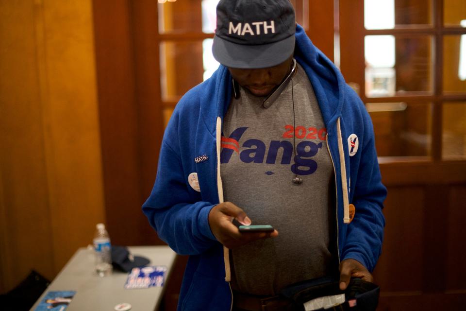 Man in an Andrew Yang "math" hat