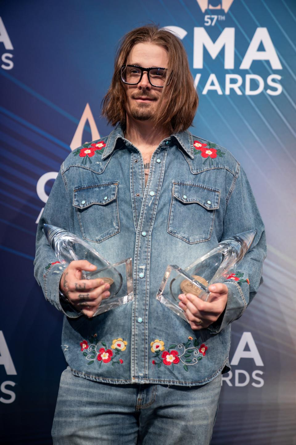 Hardy holds his awards in the backstage media center during the 57th Annual Country Music Association Awards in Nashville, Tenn., Wednesday, Nov. 8, 2023.