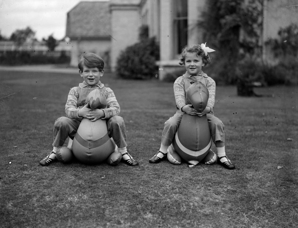 <p>The young royal siblings Prince Edward and Princess Alexandra played with toys in the garden of their Buckinghamshire home.</p>