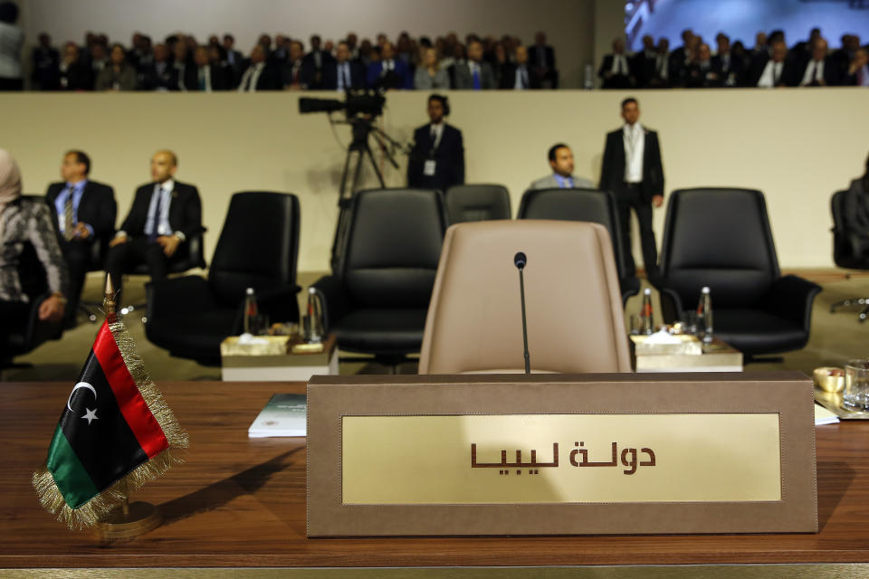 The chair of the State of Libya is empty at the Arab Economic and Social Development Summit, in Beirut, Lebanon, Sunday, Jan. 20, 2019. Lebanon used the summit Sunday to call for the start of return of Syrian refugees to safe areas in their war-torn country even before a solution is reached to end the nearly eight-year-old crisis that killed nearly half a million people. (AP Photo/Bilal Hussein)