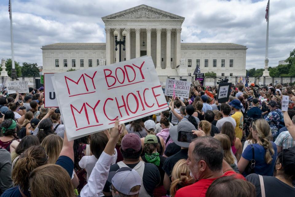 <span class="caption">Abortion-rights protesters regroup and demonstrate outside the U.S. Supreme Court following the court’s decision to overturn Roe v. Wade.</span> <span class="attribution"><span class="source">(AP Photo/Gemunu Amarasinghe)</span></span>