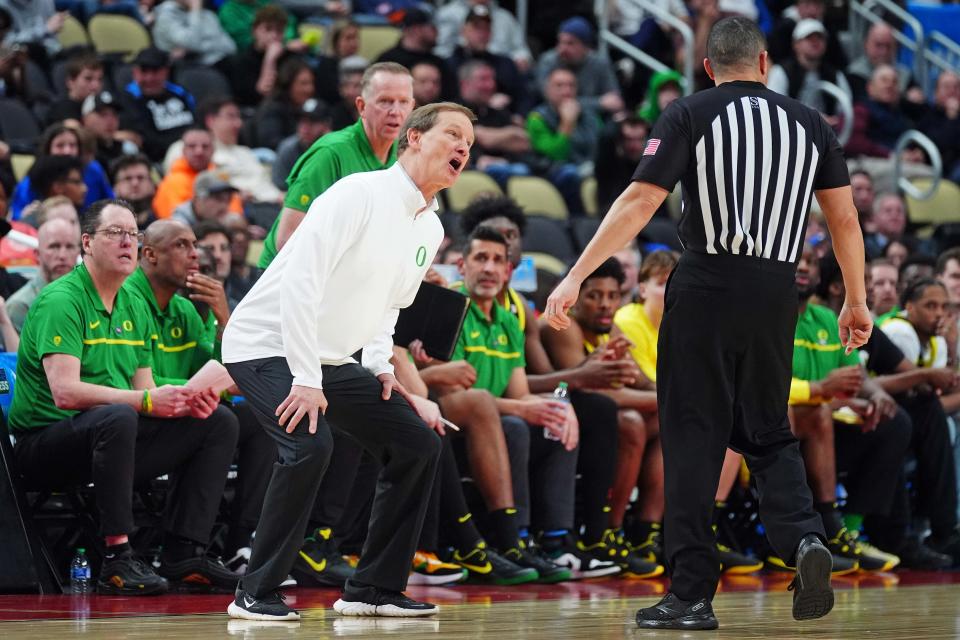 Oregon Ducks head coach Dana Altman talks to a referee during the second half of the game against the Creighton Bluejays in the second round of the 2024 NCAA Tournament at PPG Paints Arena March 23, 2024, in Pittsburgh, Pennsylvania.