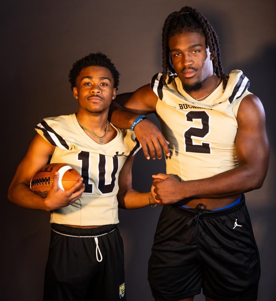 The Gainesville Sun Big School Offensive Player of the Year is running back Quinton Cutler, left from Buchholz High School and Defense Player of the Year is linebacker Myles Graham, also of Buchholz High School. Graham will be a linebacker for the Florida Gators. [Doug Engle/Ocala Star Banner]2024