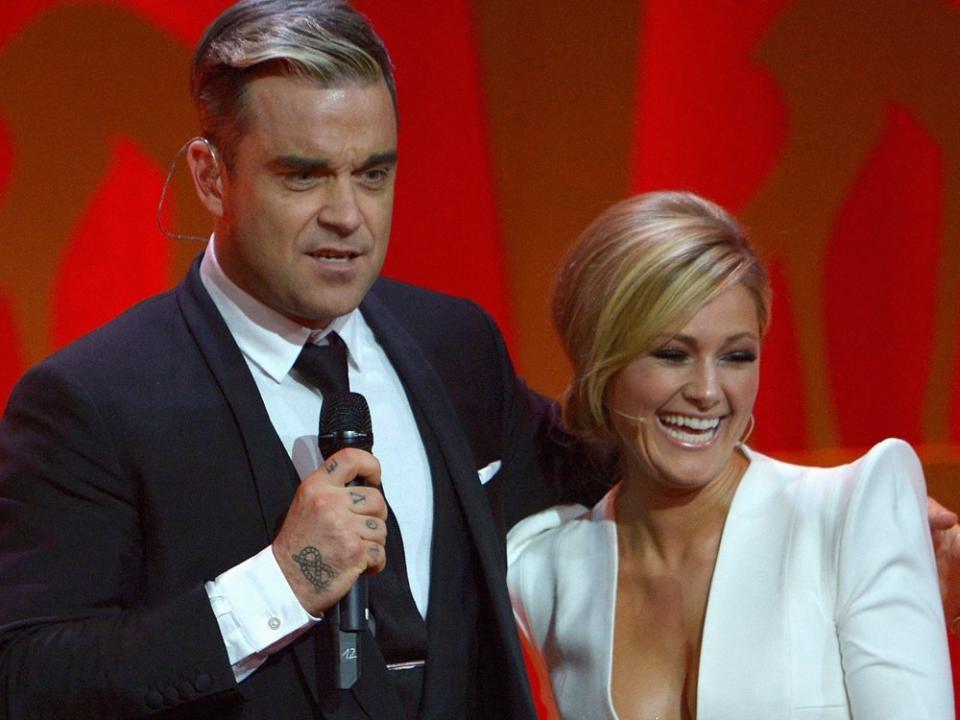 Sie kennen sich schon lange: Robbie Williams und Helene Fischer bei der Bambi-Verleihung im Jahr 2013. (Bild: Luca Teuchmann/Getty Images)