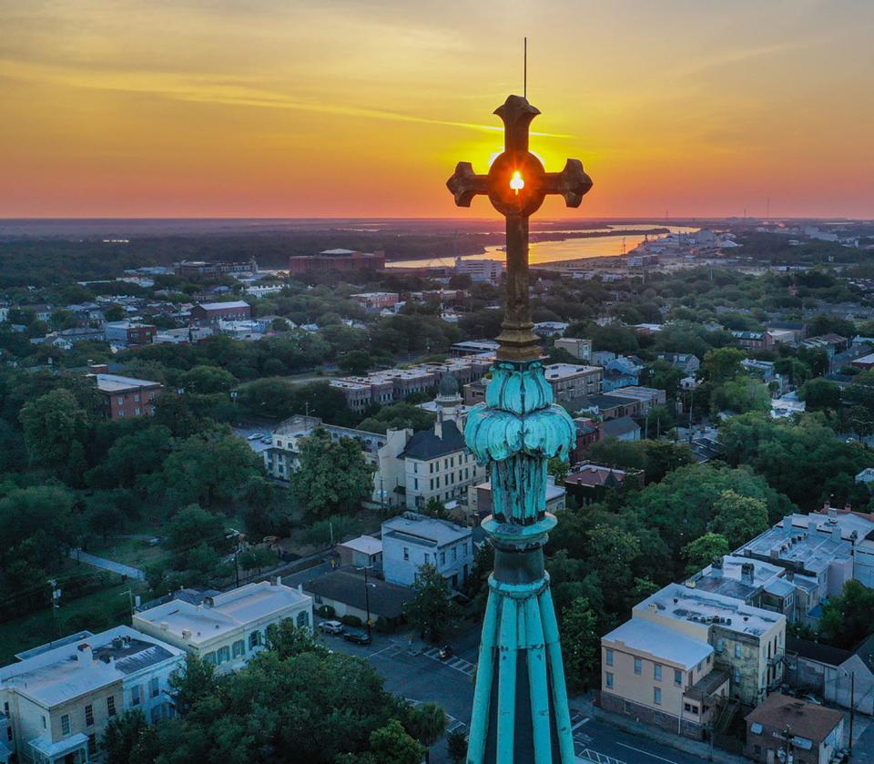 Having grown up in Savannah and a member of the Cathedral parish, this picture is one of my favorites. I captured this with a drone just as the sun was rising over the Savannah River and bringing morning to the streets of the historic district. Most of us never have the opportunity to see the spires of the Cathedral up close, so I am happy to be able to share the beauty and unique architecture of one of Savannah’s oldest and most beautiful churches.