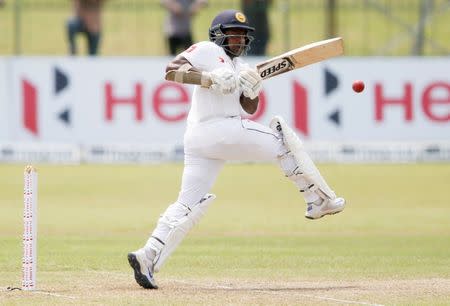 Cricket - Sri Lanka v South Africa -Second Test Match - Colombo, Sri Lanka - July 21, 2018 - Sri Lanka's Rangana Herath plays a shot. REUTERS/Dinuka Liyanawatte