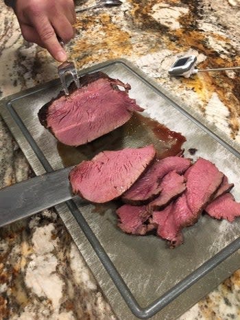 a reviewer shows a finished meal after using the device