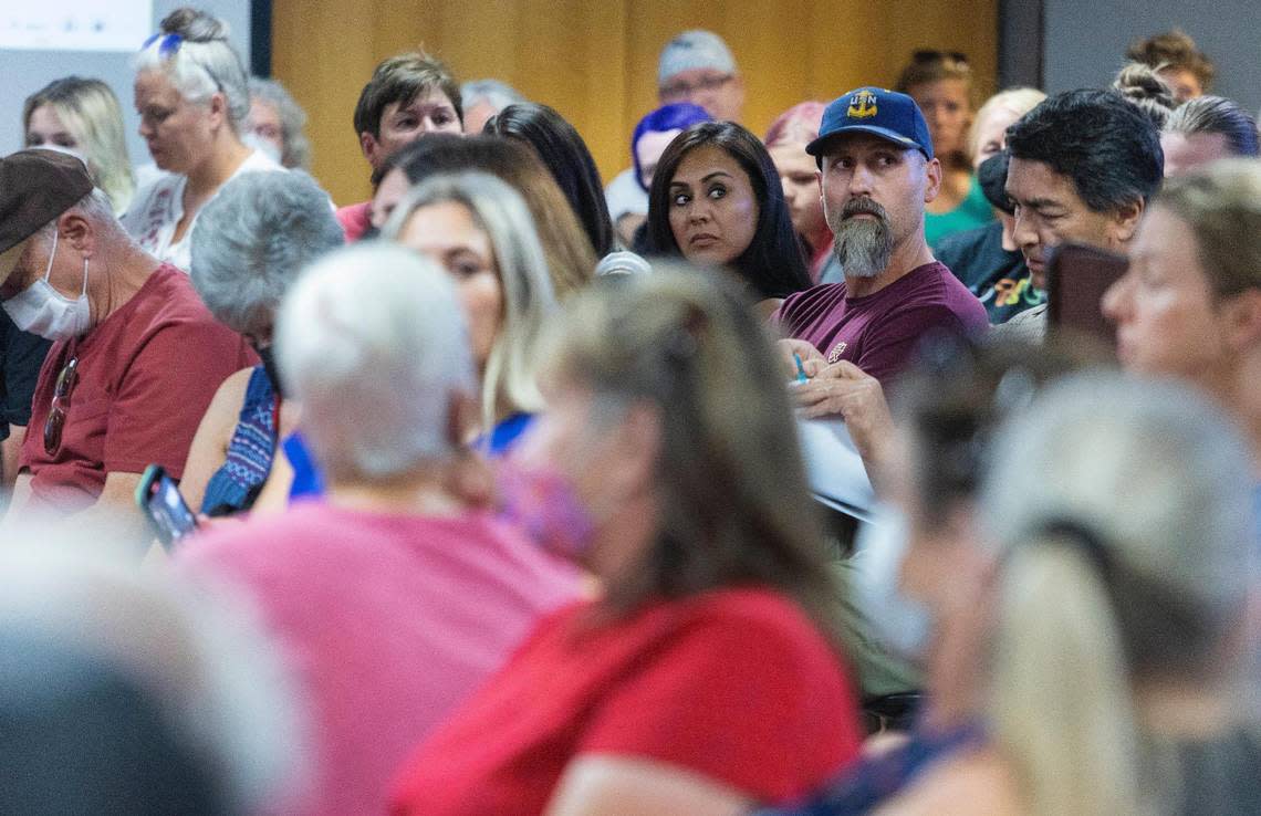 A crowd of over 100 people attend the Meridian Library District’s board of trustees monthly meeting on Wednesday, Aug. 17, 2022. During the public comment section, some citizens spoke on the issue of the role of the library in the community and on the topic of books containing nudity or depictions of sex that are available to children.