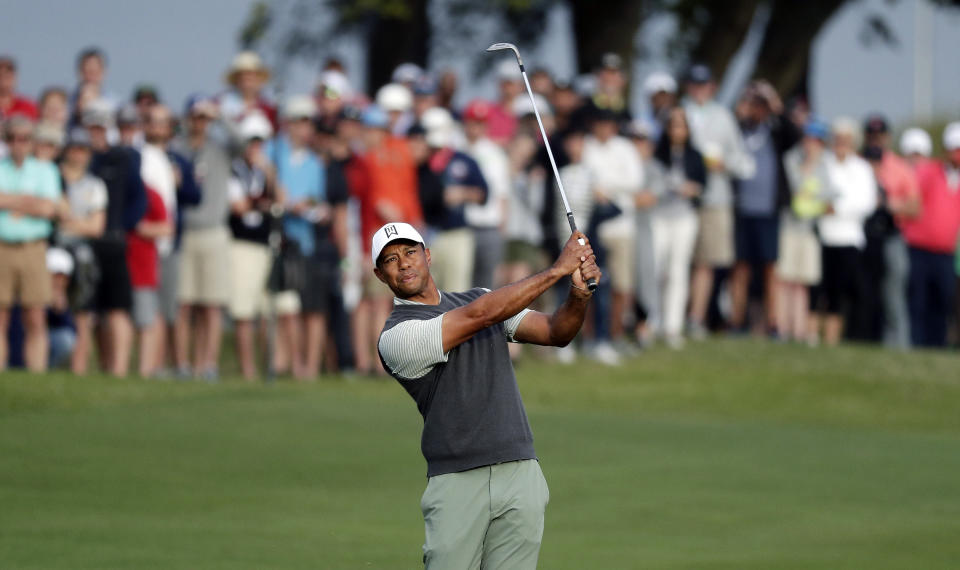 Tiger Woods watches his shot on the first hole during fourth round play at the Dell Technologies Match Play Championship golf tournament, Saturday, March 30, 2019, in Austin, Texas. (AP Photo/Eric Gay)
