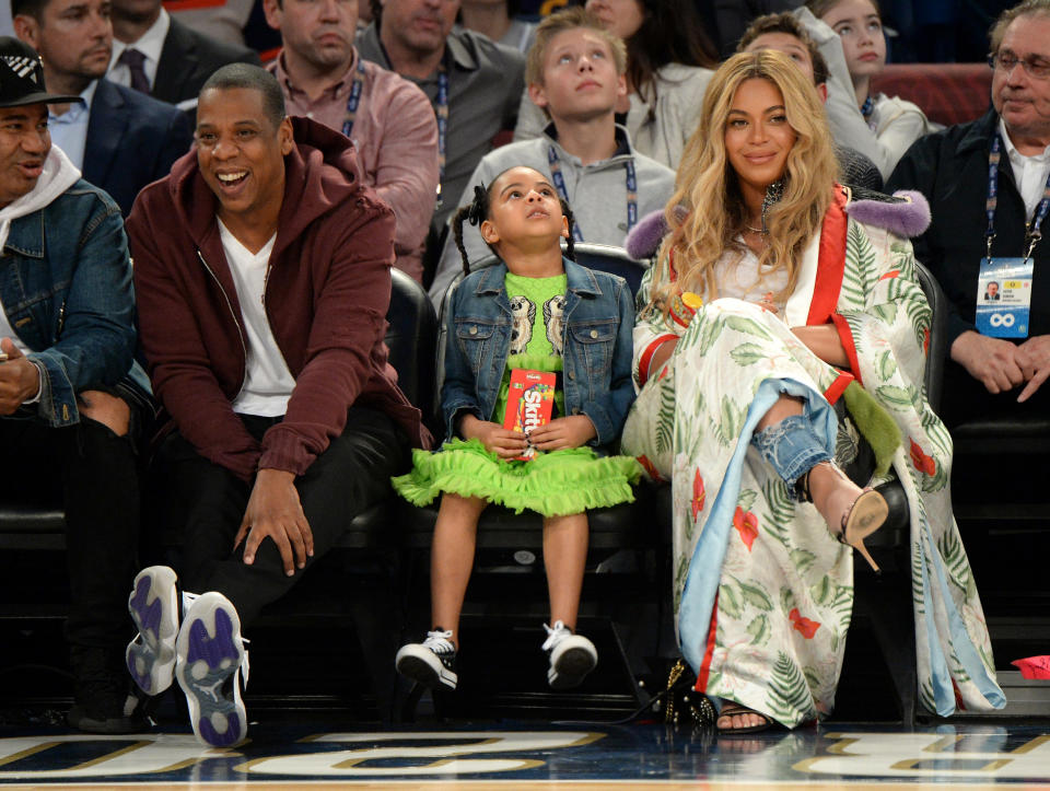 Beyoncé, left, pictured with daughter Blue Ivy and husband Jay-Z