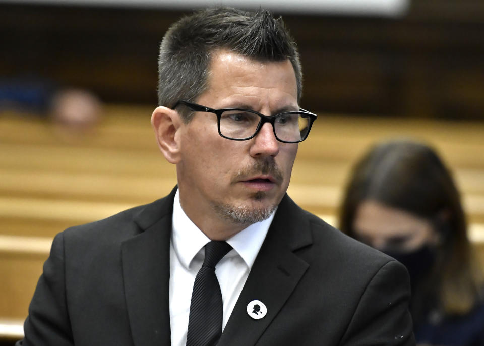 Assistant District Attorney Thomas Binger listens during a motion hearing, Tuesday, Oct. 5, 2021, in Kenosha, Wis., for Kyle Rittenhouse, who is accused of shooting three people during a protest against police brutality in Wisconsin last year. (Sean Krajacic/The Kenosha News via AP, Pool)