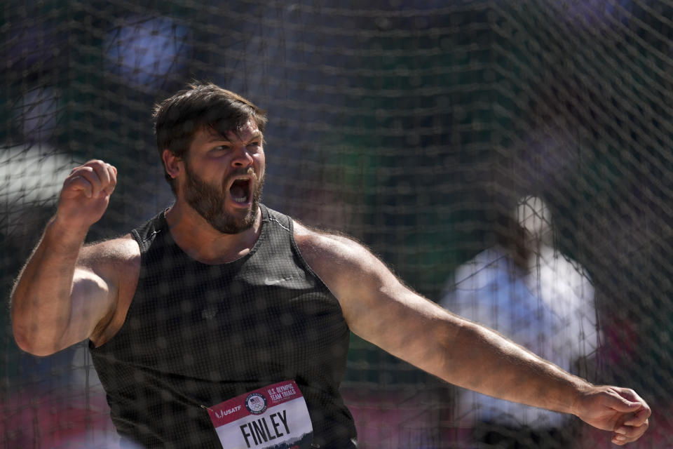 Mason Finley celebrates during the finals of men's discus throw at the U.S. Olympic Track and Field Trials Friday, June 25, 2021, in Eugene, Ore. (AP Photo/Charlie Riedel)