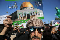 <p>Iraqi supporters of Shiite cleric Moqtada al-Sadr demonstrate after the Friday noon prayers in Baghdad on December 8, 2017 to denounce the widely criticised U.S. decision to recognise Jerusalem as the capital of Israel. (Photo: Ahmad Al-Rubaye/AFP/Getty Images) </p>