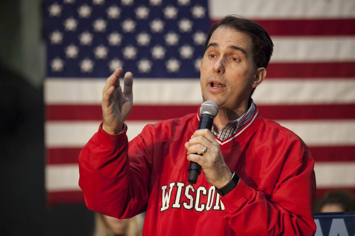 GOP Gov. Scott Walker of Wisconsin speaks to supporters at a last-minute rally the night before the midterm elections on Nov. 5 in Waukesha, Wis. (Photo: Darren Hauck/Getty Images)