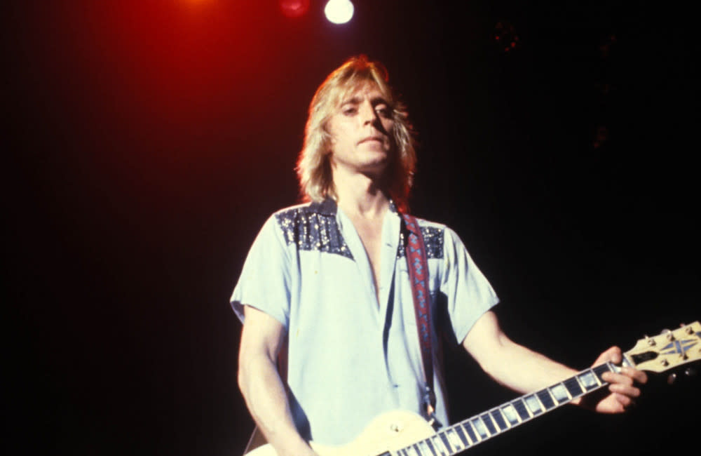 Mick Ronson's widow doesn't think he should have gone solo credit:Bang Showbiz