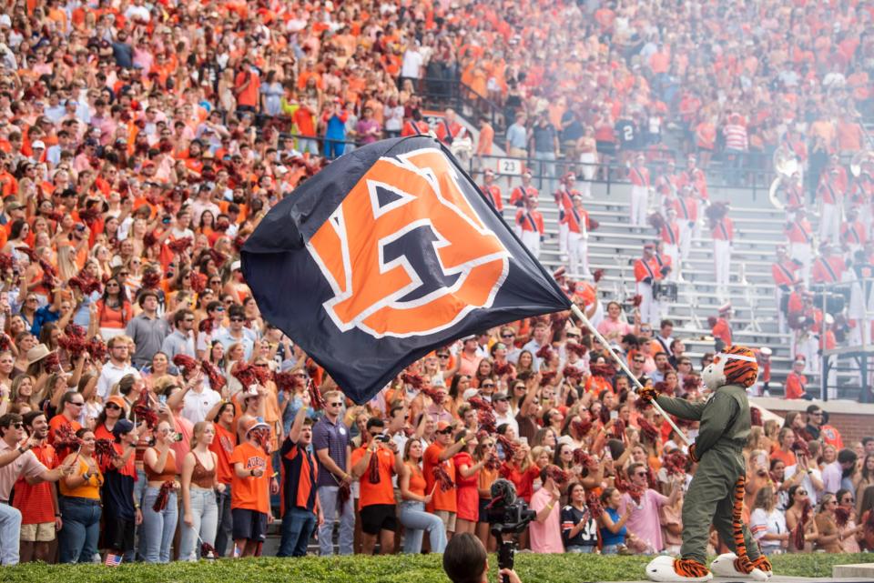 Aubie waves a flag before the game as Auburn Tigers take on Mississippi State Bulldogs at Jordan-Hare Stadium in Auburn, Ala., on Saturday, Oct. 28, 2023. Auburn Tigers defeated Mississippi State Bulldogs 27-13.